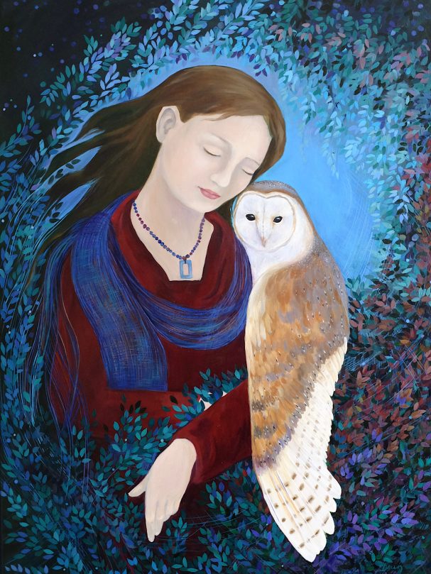 A serene woman in a blue background holds a barn owl, surrounded by foliage.