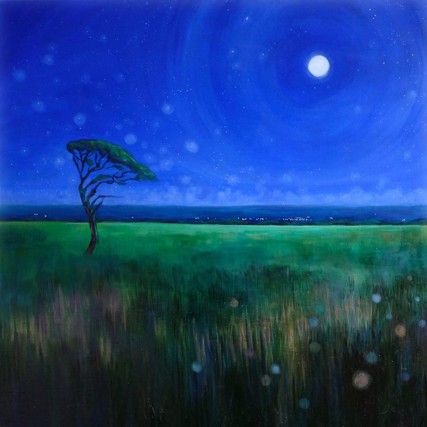 A lone tree stands in a grassy field under a bright moonlit sky.